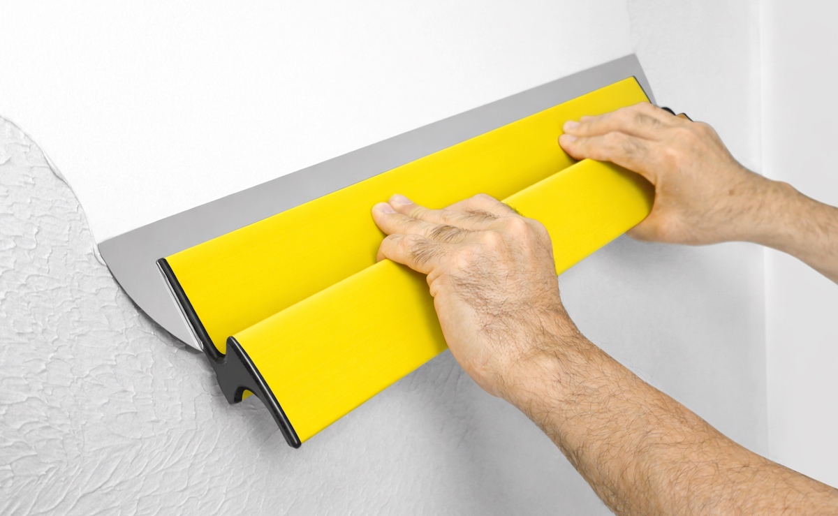 Réparations de murs avant travaux de peinture